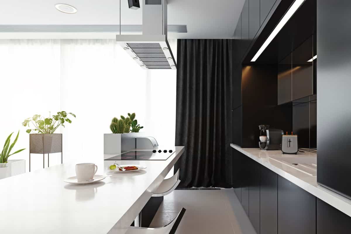 Modern contemporary hotel kitchen area with aluminum panel kitchen cabinets and cupboards