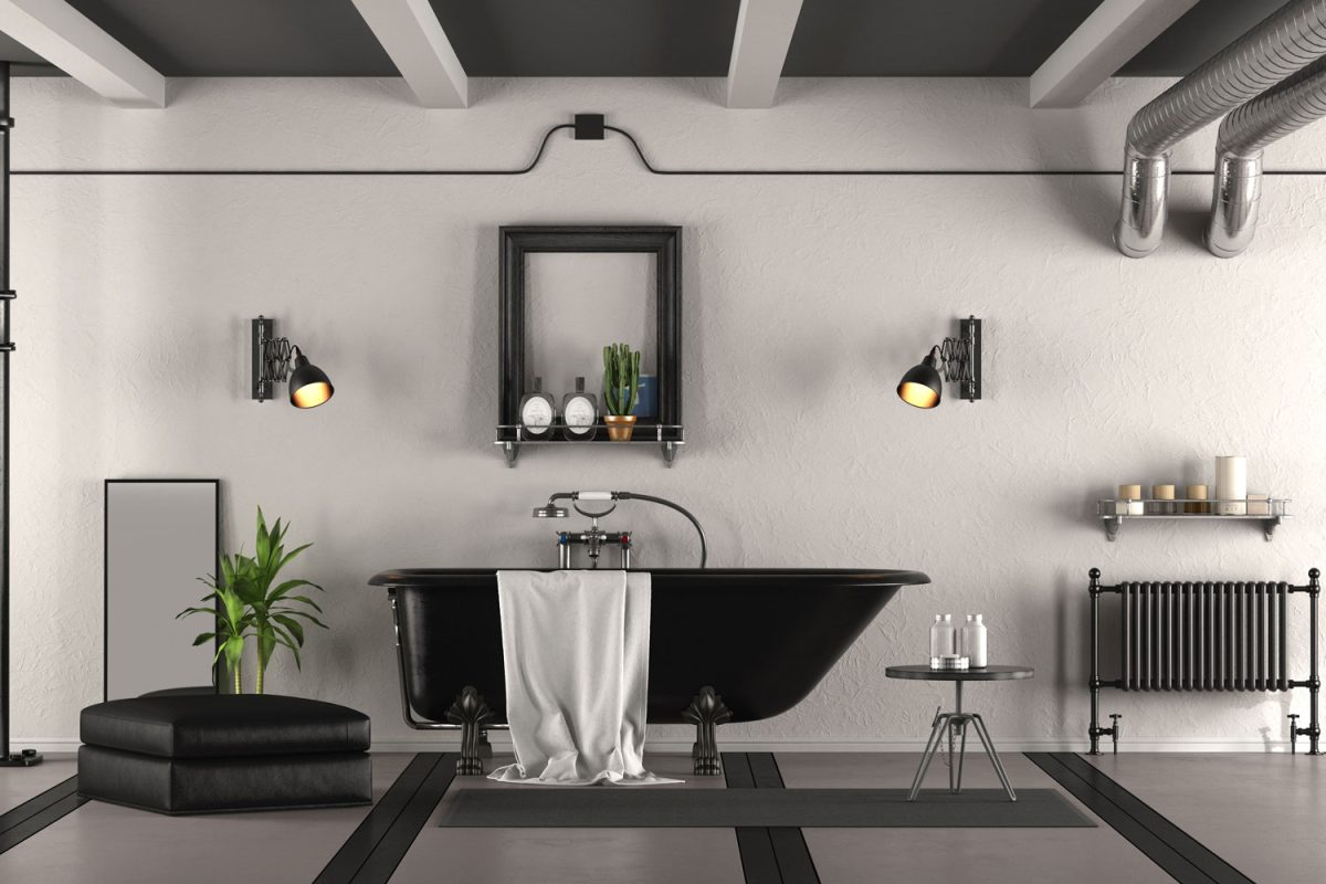 A black bathtub inside a gorgeous modern bathroom