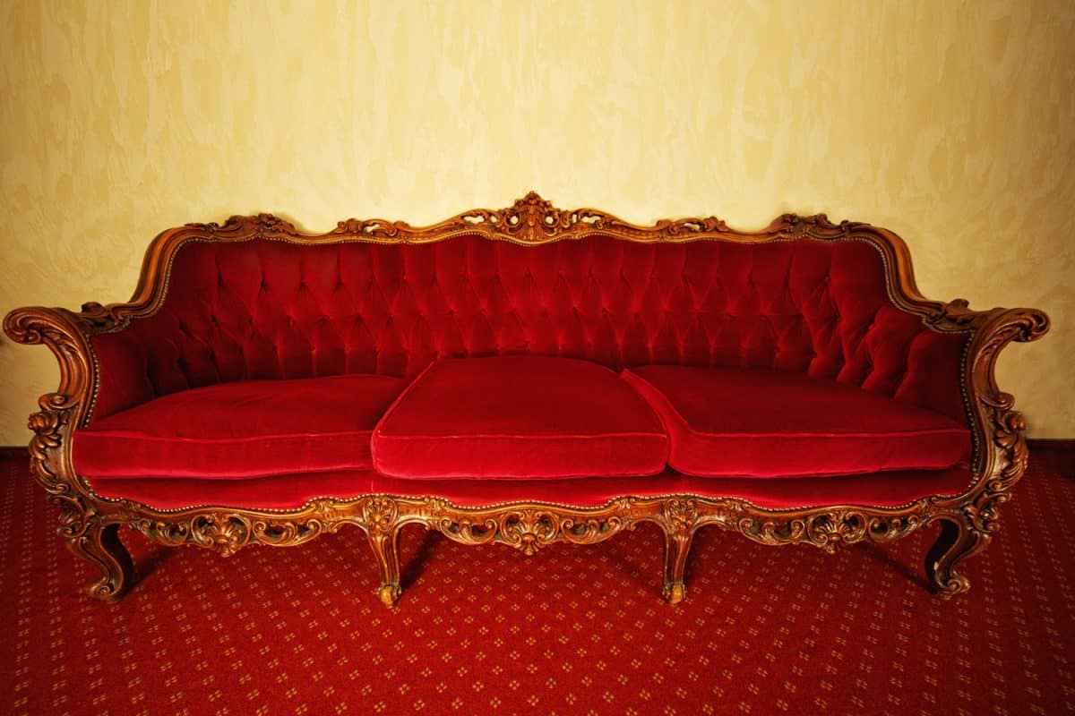 A royalty sofa with gold plated corners