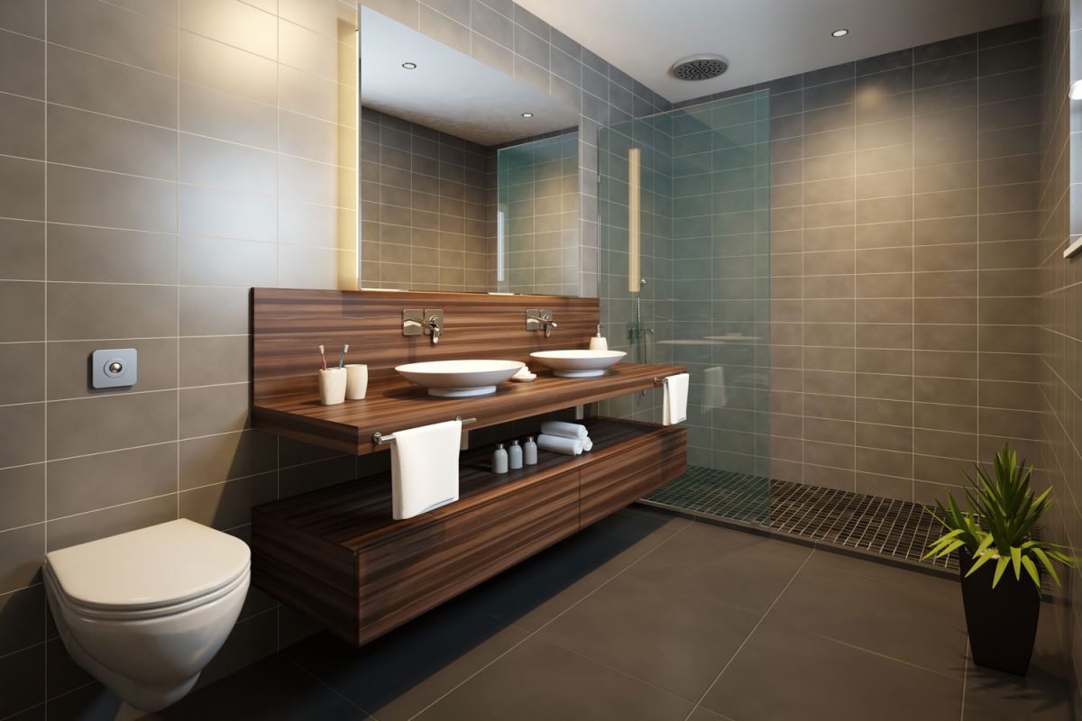 A wooden cabinet area inside a gorgeous luxurious ultra modern bathroom