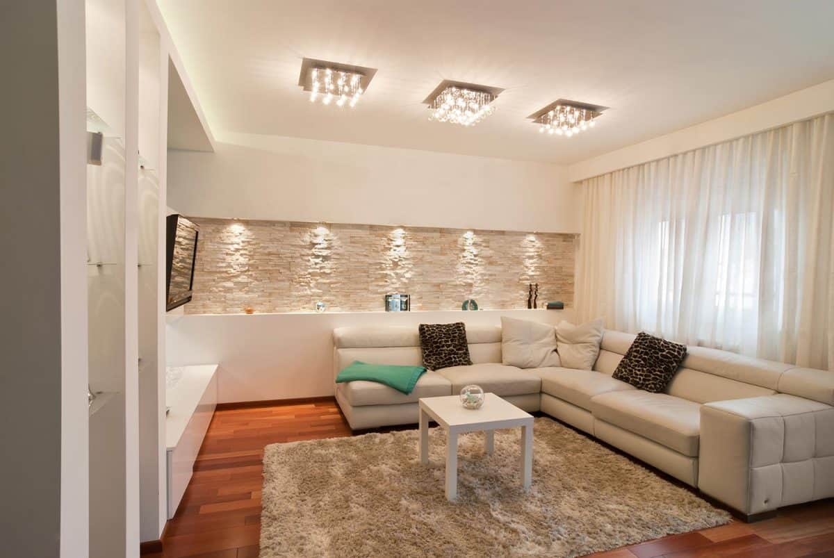 Bright living room with white couch