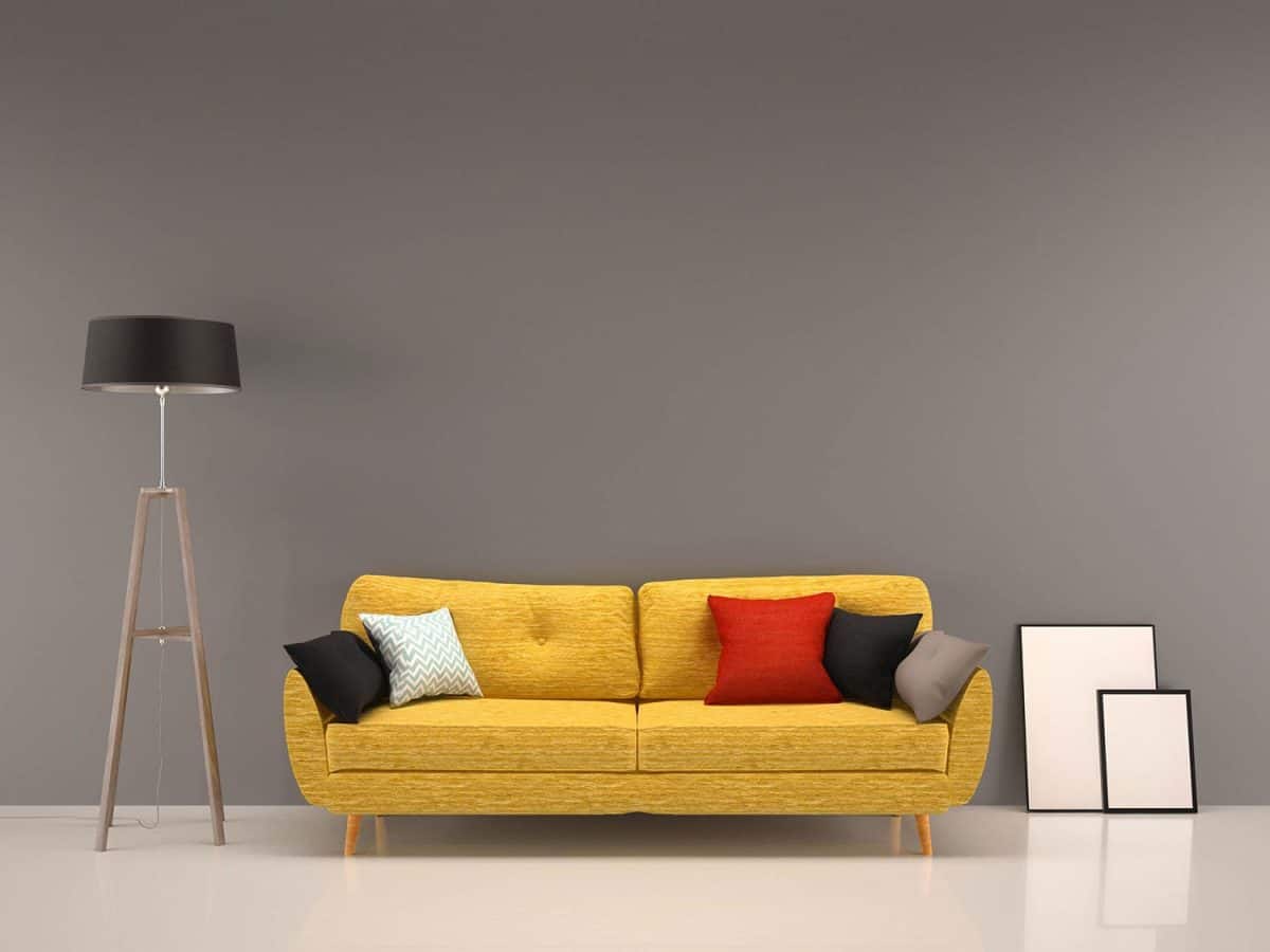 Living room gray wall with yellow sofa