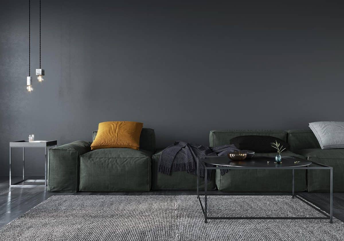 Living room interior with soft minimalist green sofa
