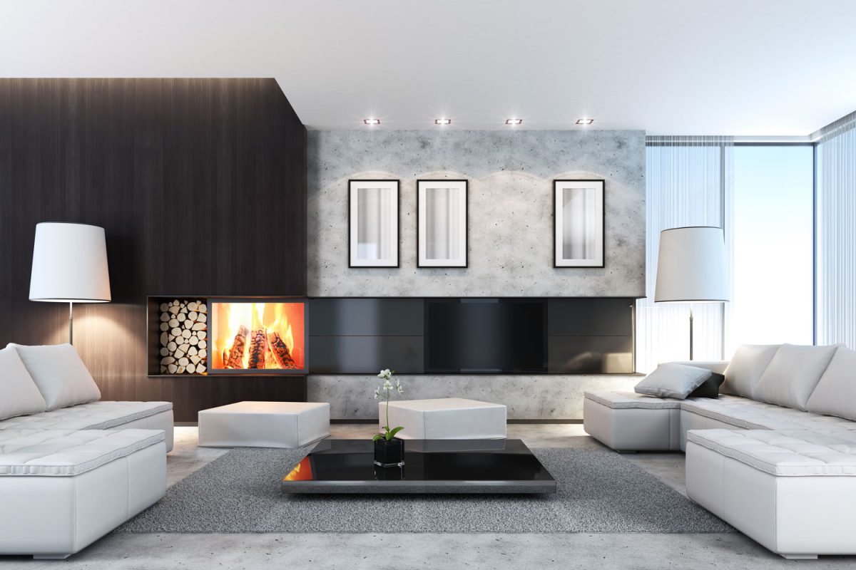 Luxurious ultra modern living room with white sectional sofas with fireplace on the side