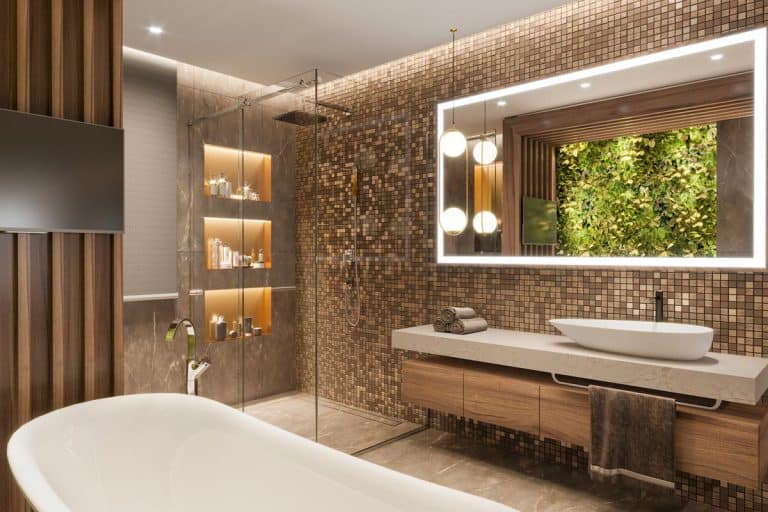A luxury apartment bathroom with a big mirror and bathtub, 11 Great Bathroom Tile Ideas For 2022