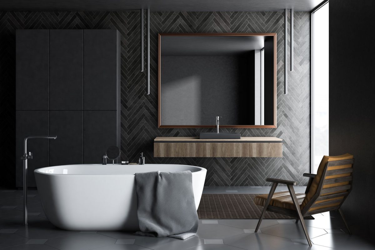 Ultra luxurious modern contemporary bathroom with patterned walls, white bathtub and an elegant vanity area