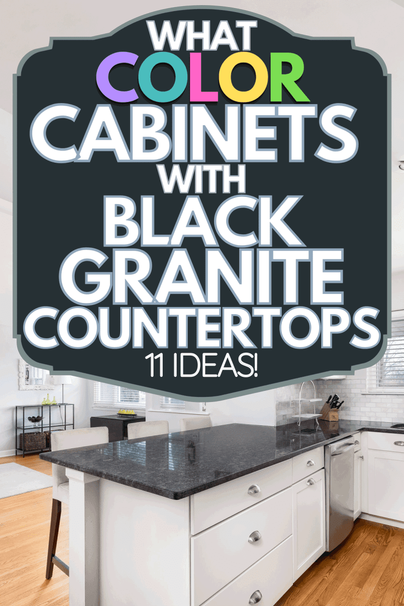 A white kitchen with chairs sitting at the black granite countertop and stainless steel appliances looking out towards a living room, What Color Cabinets With Black Granite Countertops [11 Ideas!]
