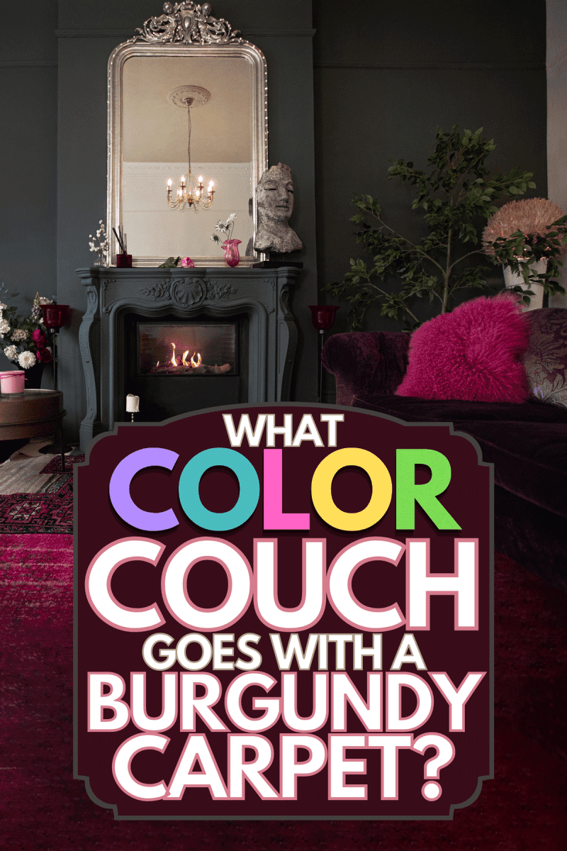 A couch near a fireplace in the living room, What Color Couch Goes With A Burgundy Carpet?