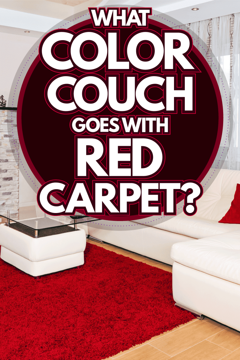 A white sofa matched with red throw pillows and a red carpet next to the fireplace, What Color Couch Goes With Red Carpet?