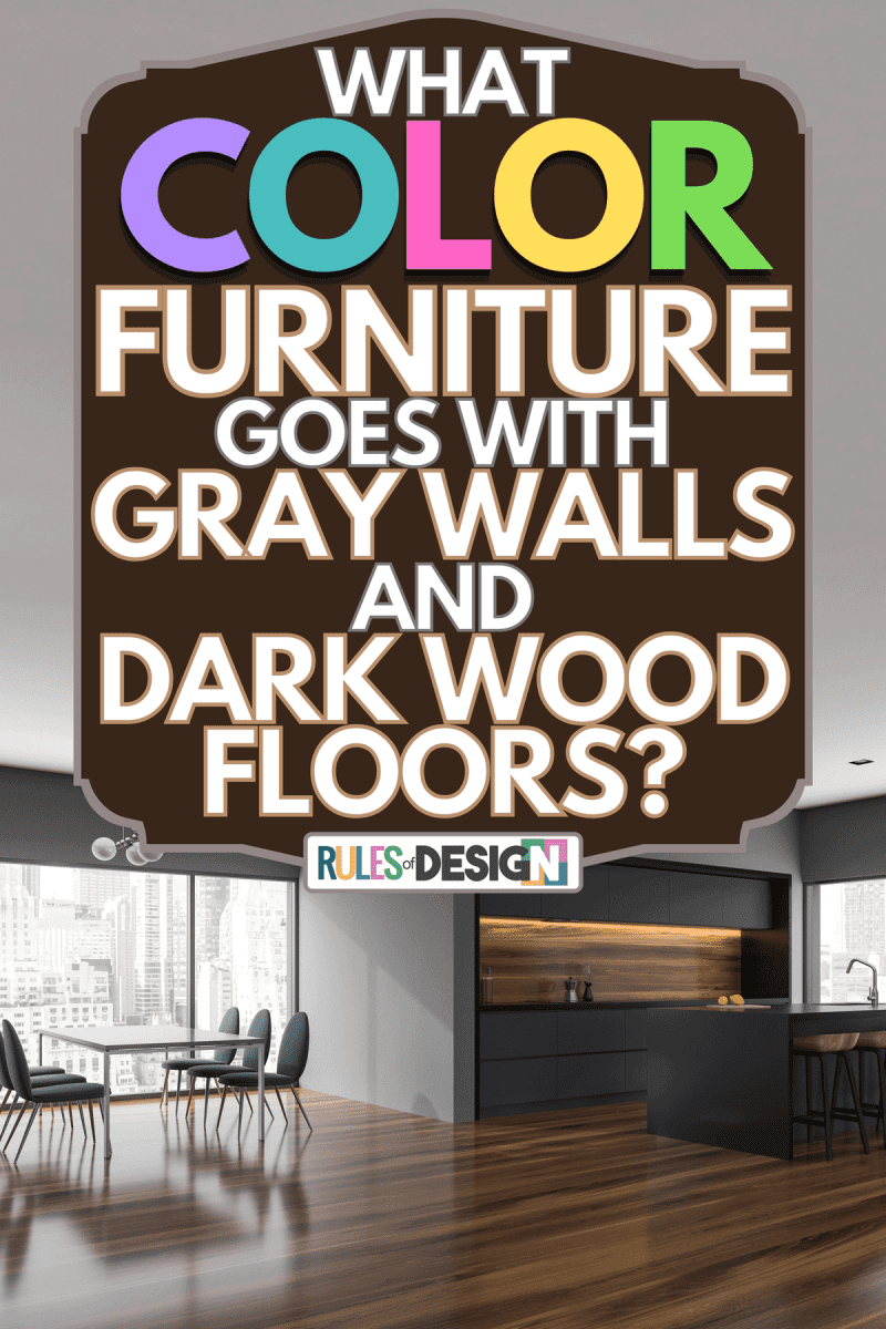 A gray dining room and kitchen corner with panoramic windows, What Color Furniture Goes With Gray Walls And Dark Wood Floors?