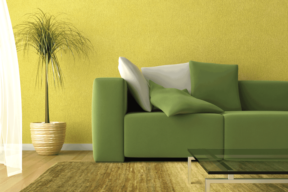 detail of a modern living room in yellow and green colors
