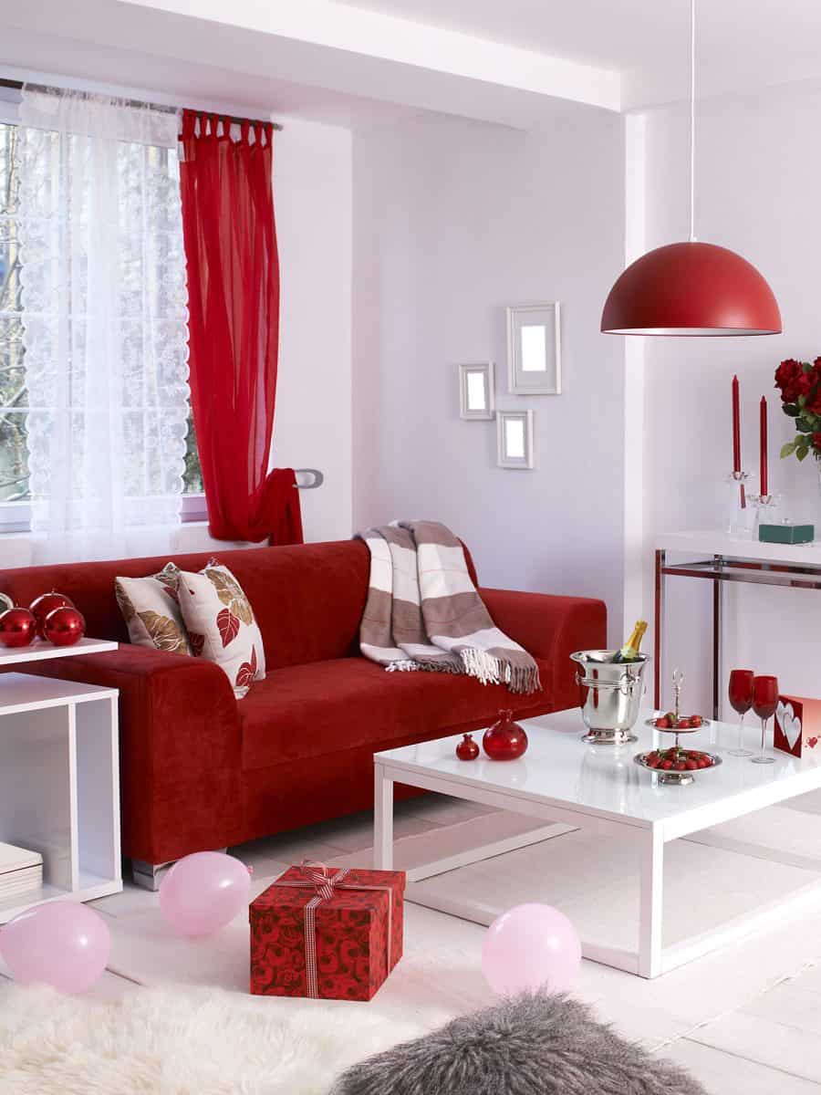 valentines day concept decoration red sofa and red lamp behind red curtain living room decoration