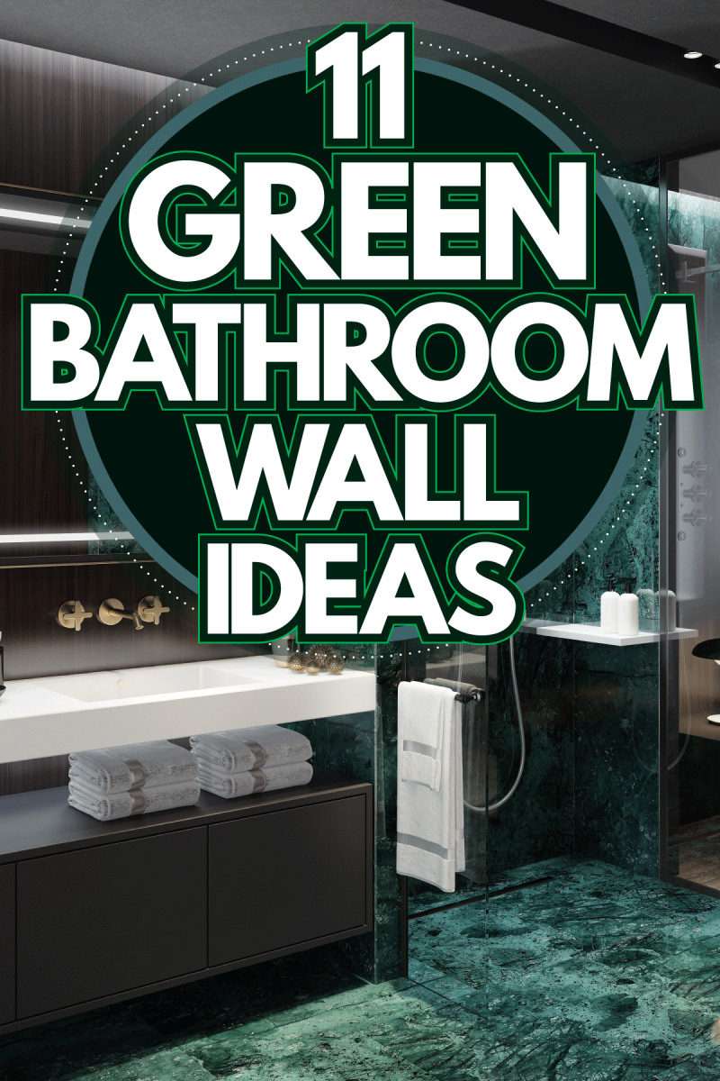 A gorgeous deep emerald bathroom with a minimalist vanity and a huge mirror, 11 Green Bathroom Wall Ideas