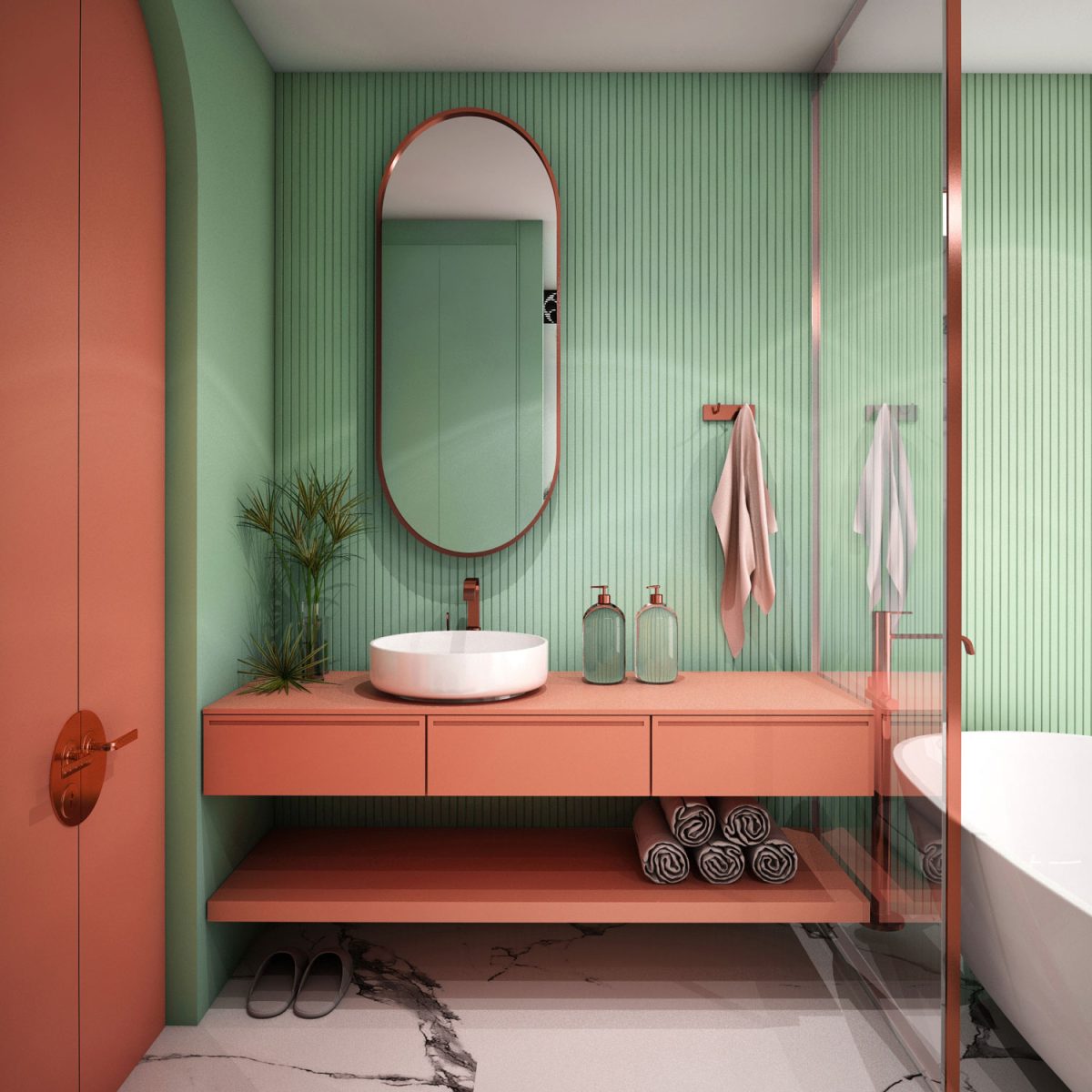 A small green and peach themed bathroom with a glass wall and a round mirror