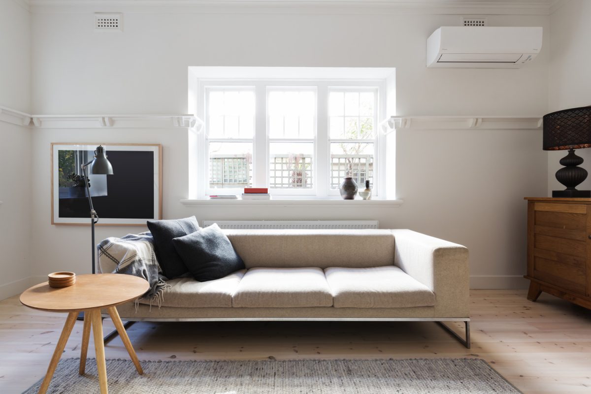 Beautifully Danish styled interior living room of sofa and coffee table in a renovated apartment
