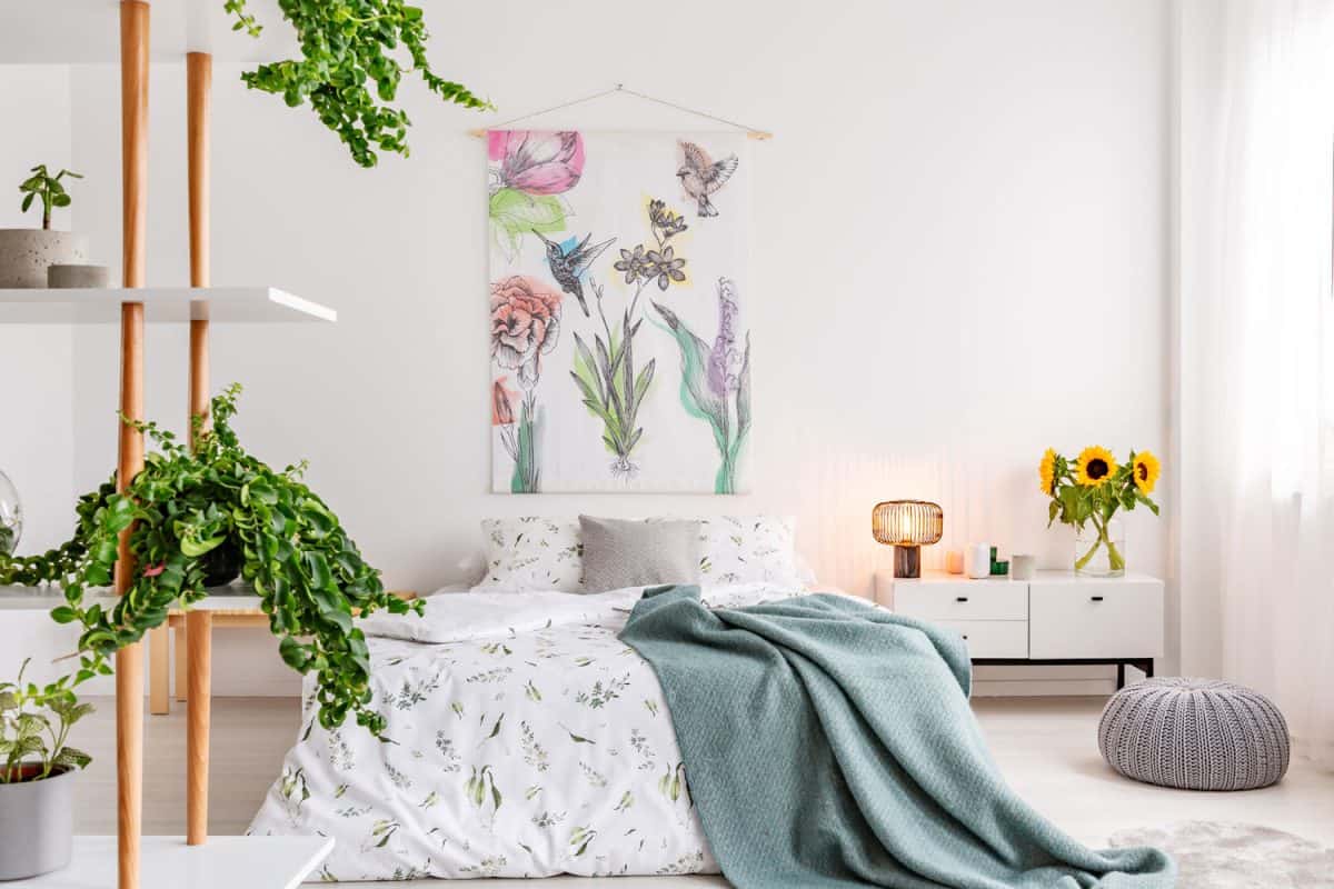 Floral inspired bedroom fused with plants for a bright nature look