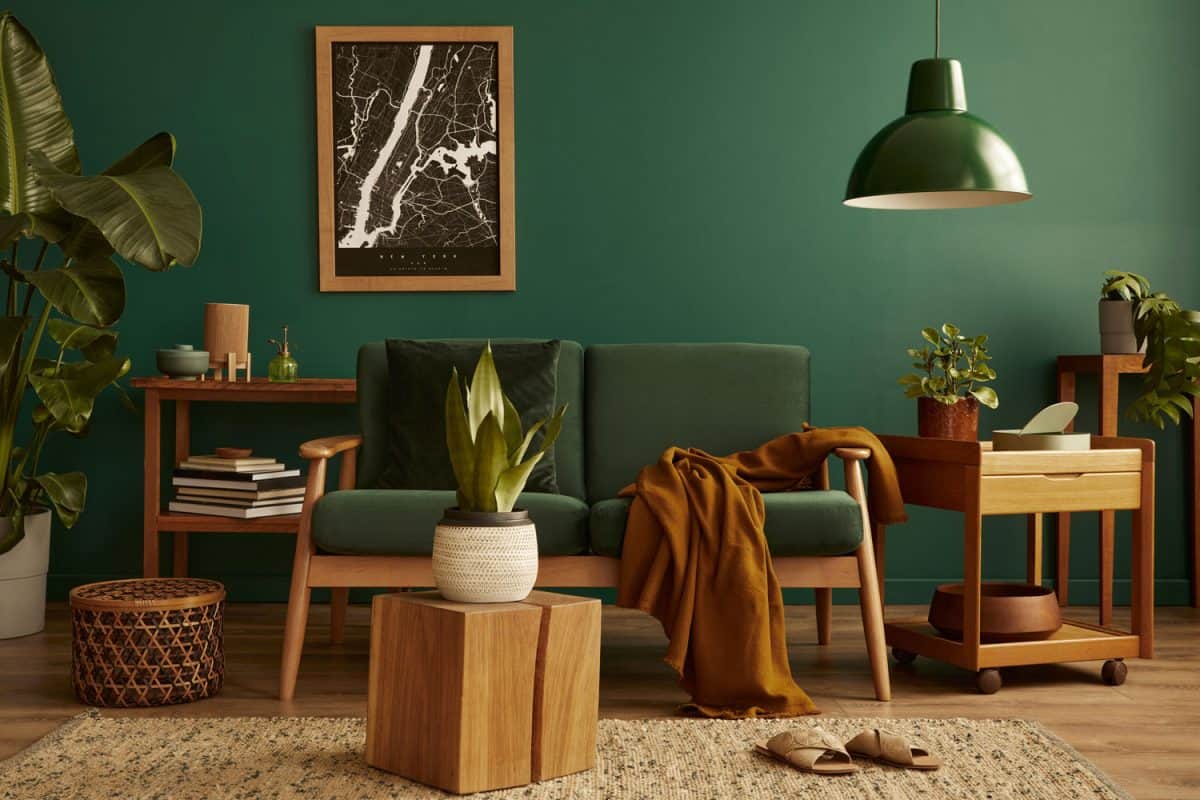 Green rustic living room with wooden furniture's fused plants
