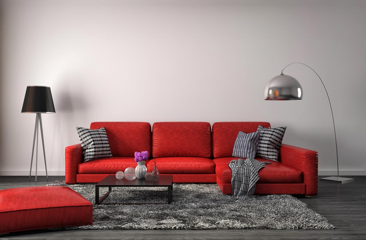 Interior of a living room with red sofa