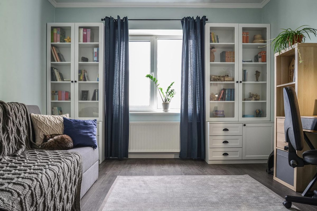 Light cozy teen room with white bookcase