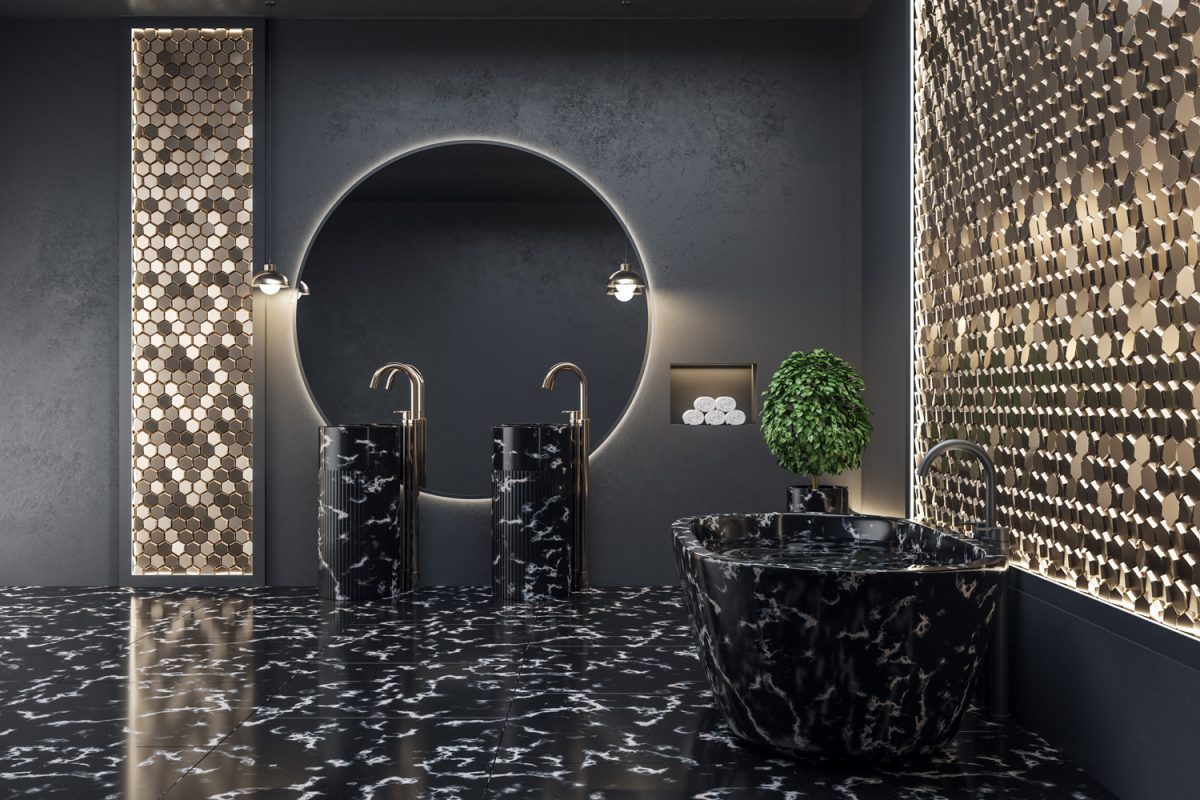 Modern bathroom interior with black marble bath and decorative golden blank wall. Style and hygiene concept.