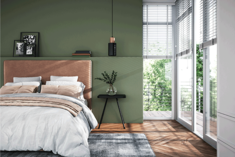 Modern interior of bedroom with green wall. Do Ruggable Rugs Curl