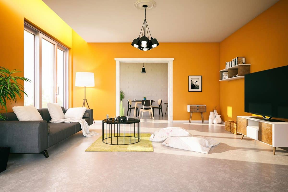 Modern living room with orange walls
