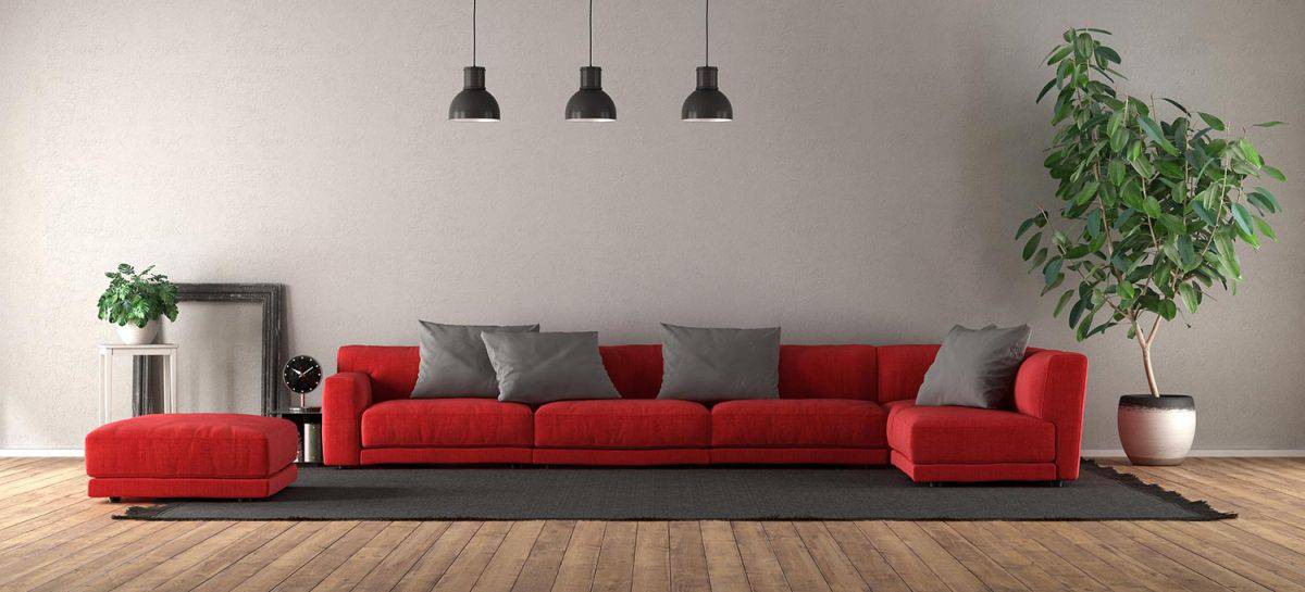 Modern living room with red sofa