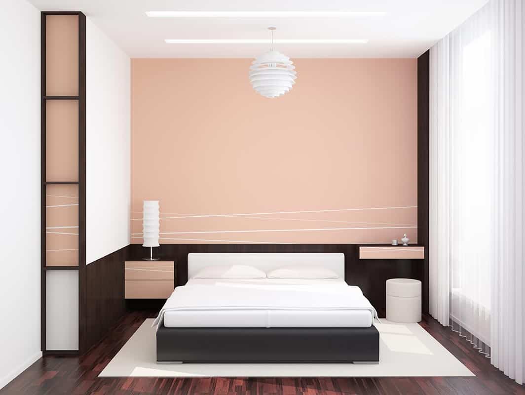Modern room with white bed near brown wall
