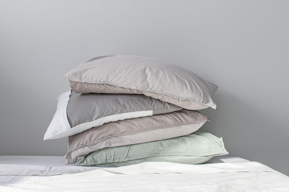 Stack of Pillows in Pillow Cases Made of Natural Materials, What Is An Envelope Pillowcase?