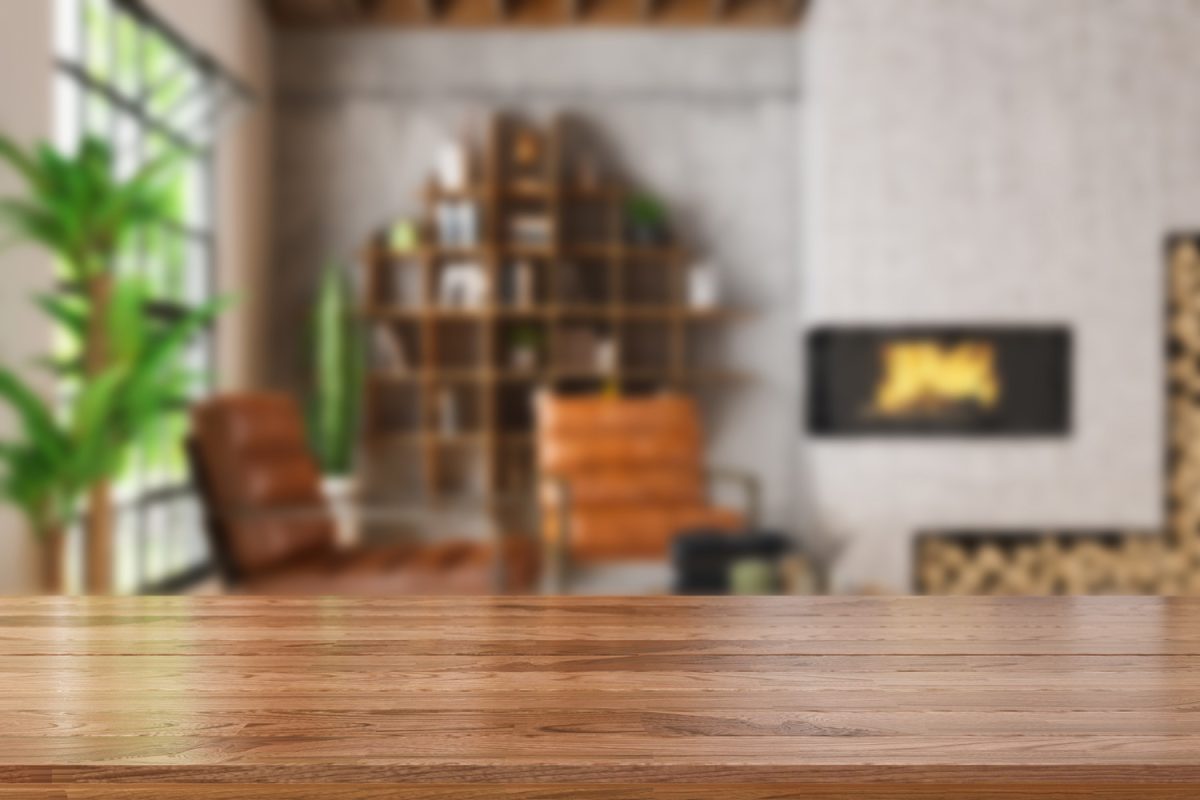 Wooden Table Top with Blur of Cozy Living Room