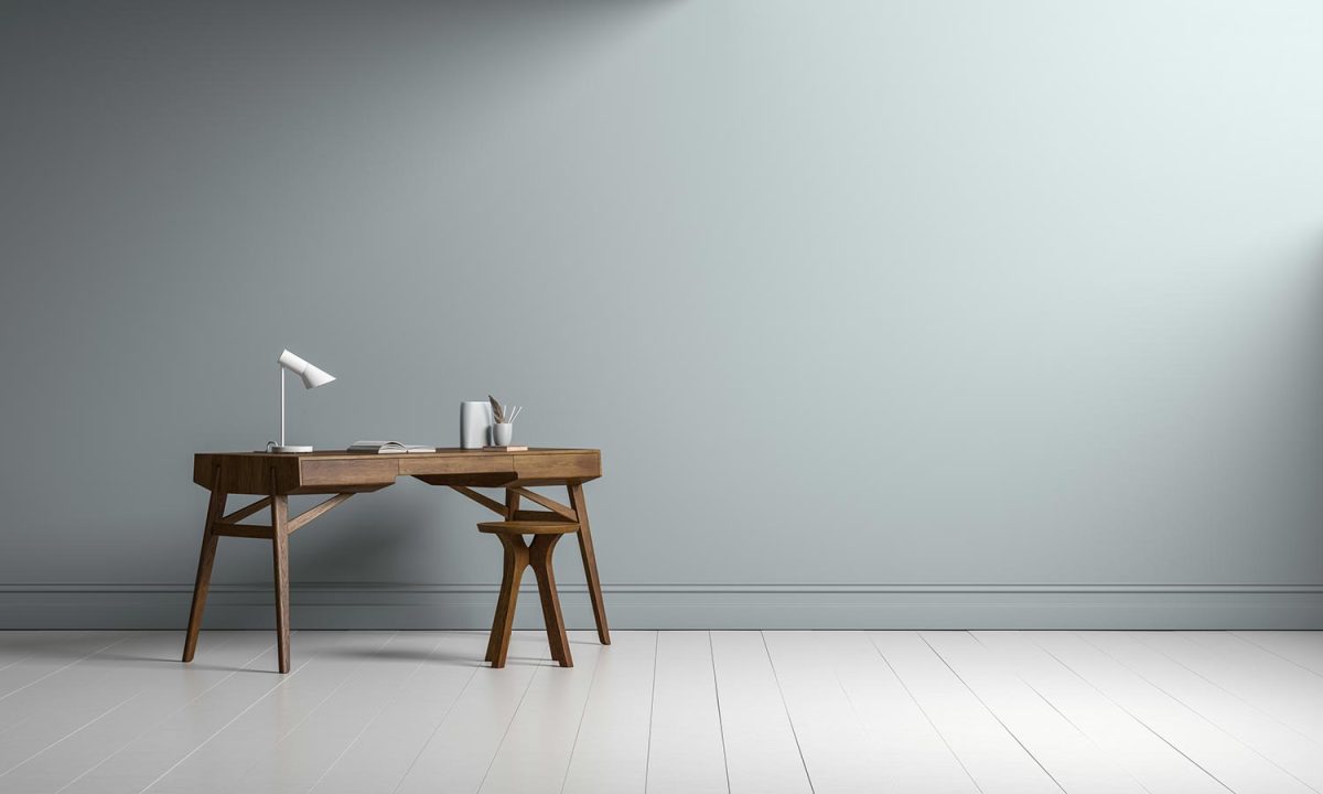 Wooden table and chair in gray wall