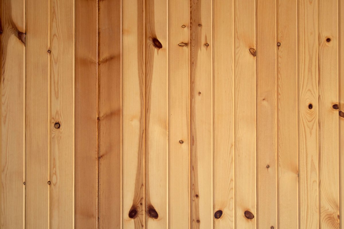Wooden walls made from knotty pine planks