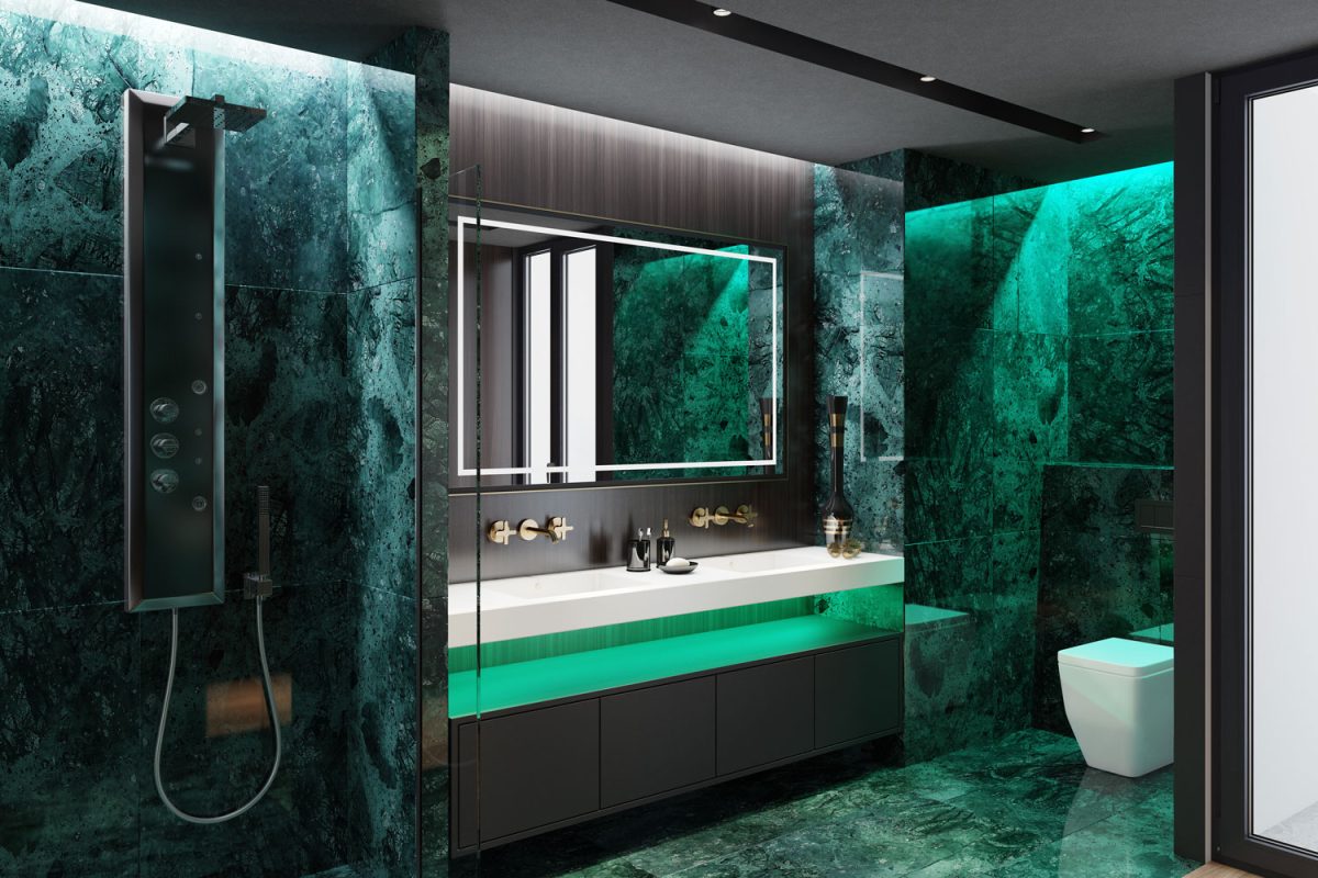 Interior of a modern bathroom with a deep emerald texture tiles and a clean minimalist vanity