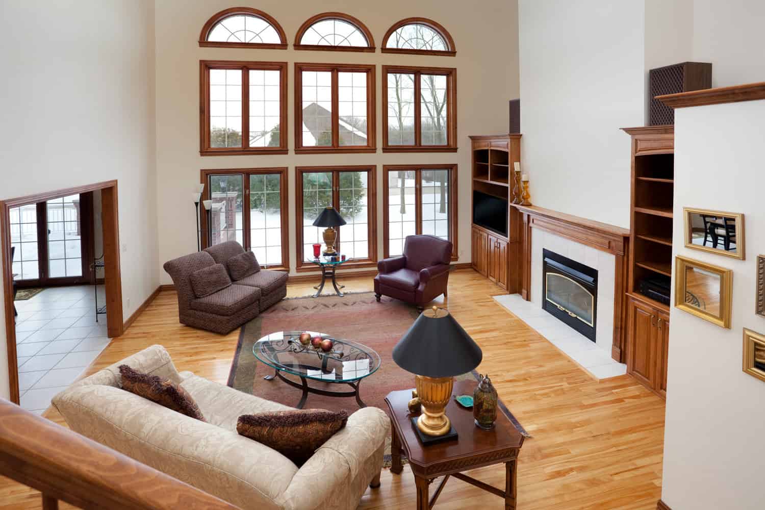 Spacious Great Room With Two Story Windows. This image also has a great space for ad copy at upper left.
